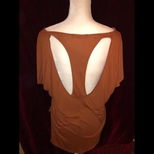 NWT top with back cut outs